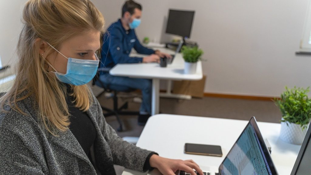 Office staff in face masks