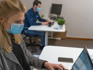 Office staff in face masks