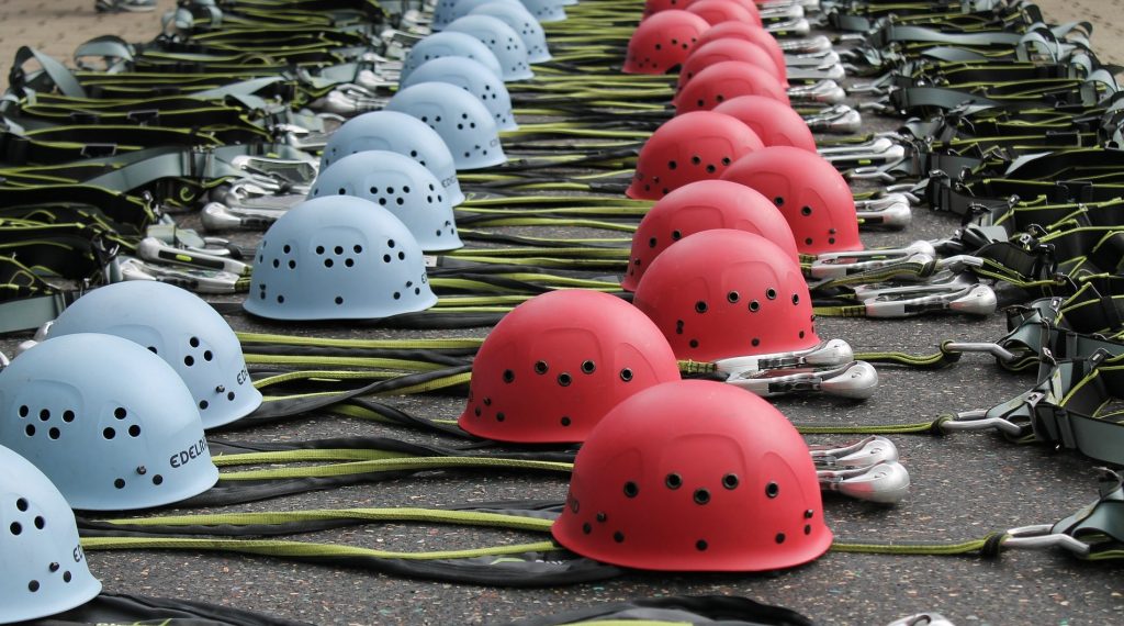 Climbing helmets red and blue