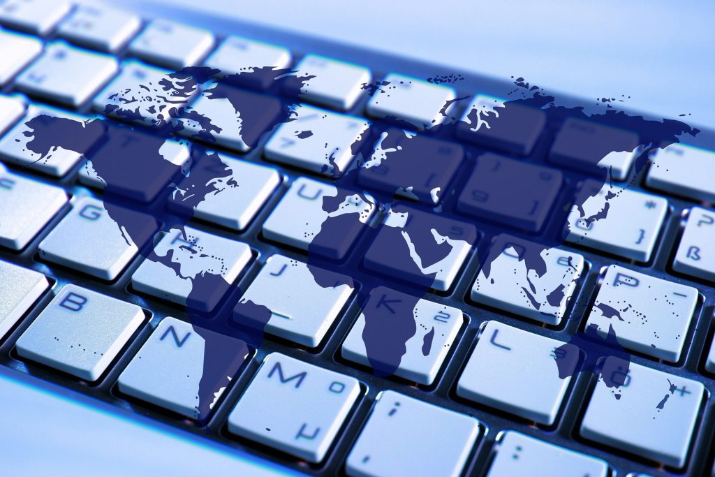 Image of world on computer keyboard